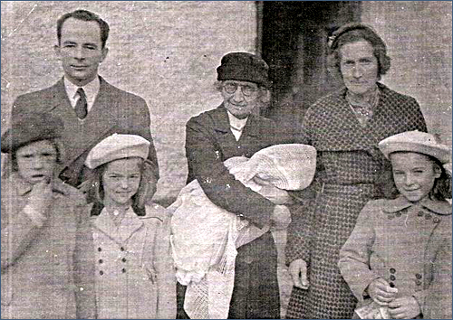 Nurse Moffett with the Carroll family c. 1951